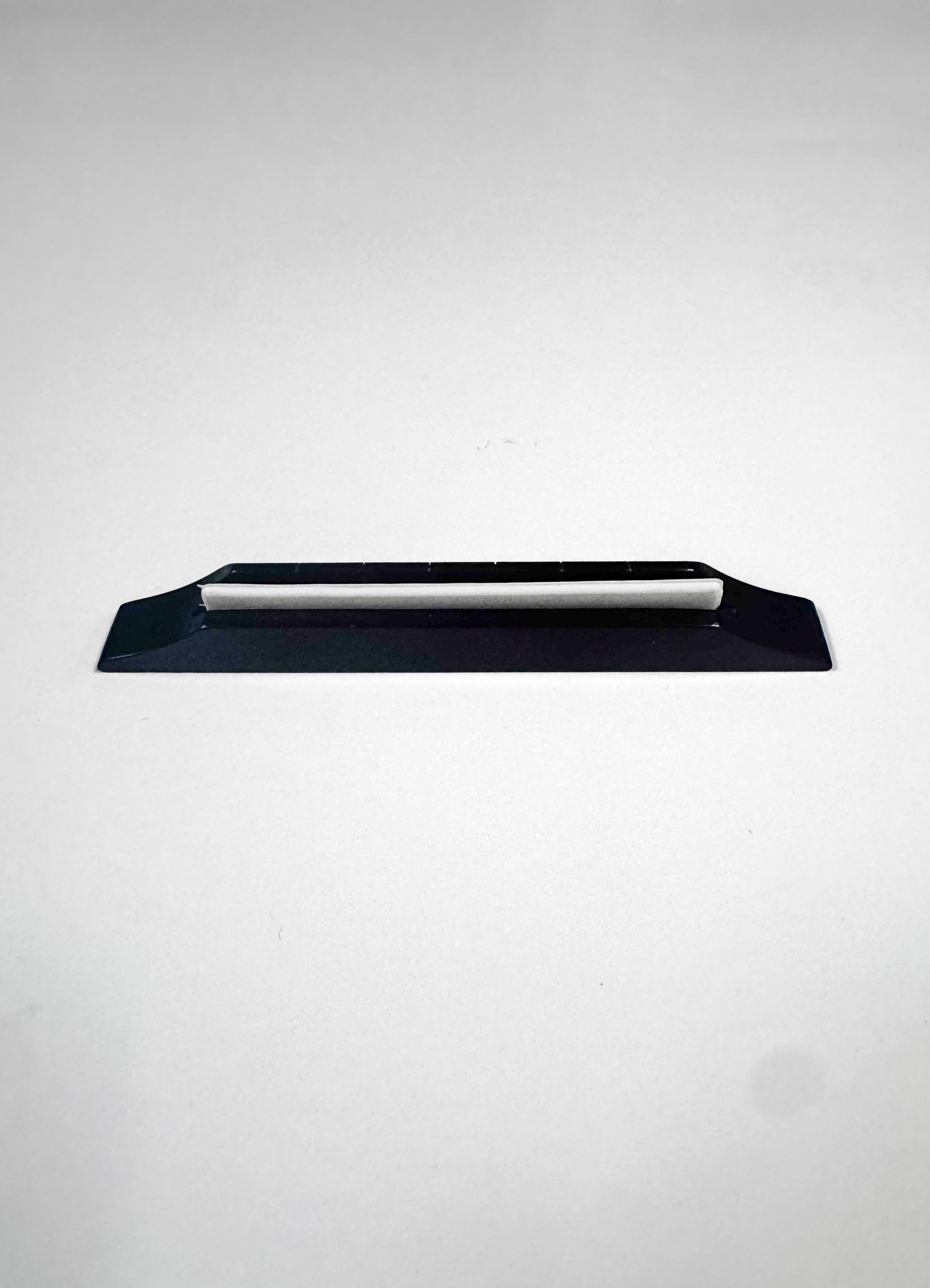 R Zayas Plastic Guitar Bridge